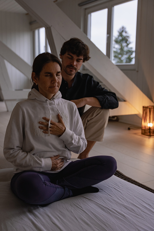 An employee gives a massage to a colleague during a stress management and relaxation program.
